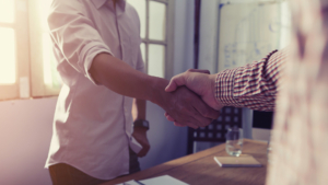 Two people shaking hands